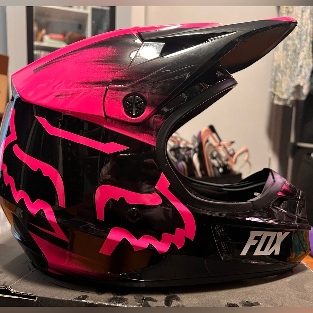 Brand new. Fox V1 racing helmet. Size small